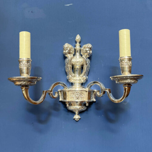 two cherub wall light