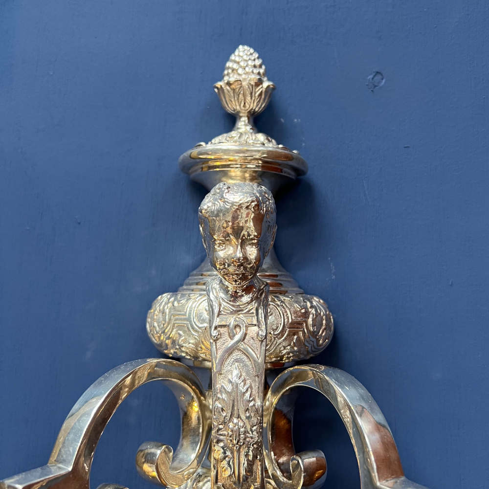 wall light with one cherub